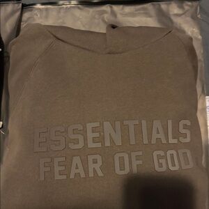 Fear of God Essentials off black  hoodie